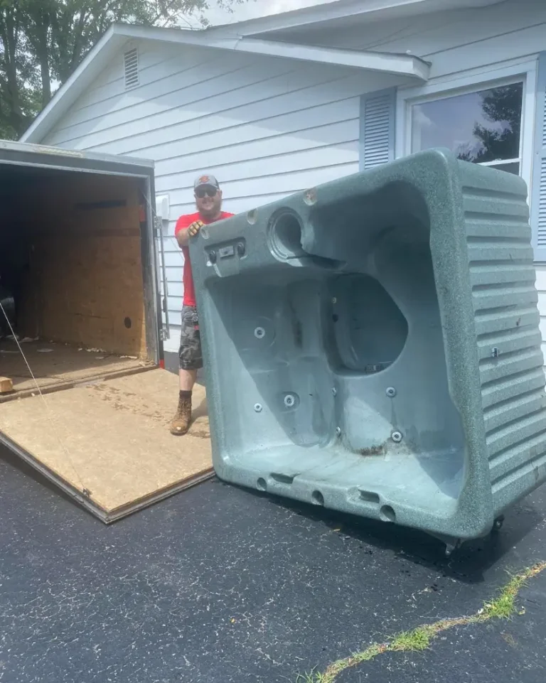 Master Junkers crew loading a hot tub for removal in Powell, Ohio